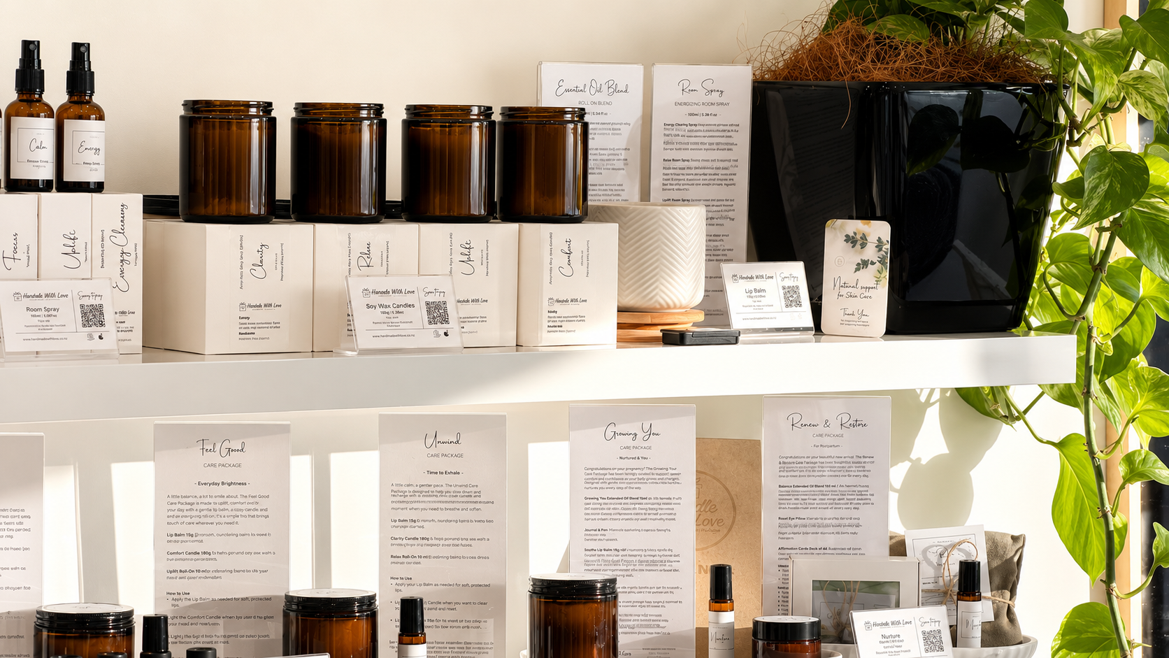 Close-up of amber skincare product bottles on a white shelf